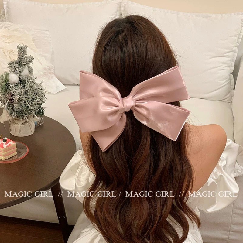 ピンクのサテンデザインの大きなリボンスプリングクリップヘアピンスーパー妖精韓国スタイルハーフタイヘアピンハイエンドヘアアクセサリー|undefined