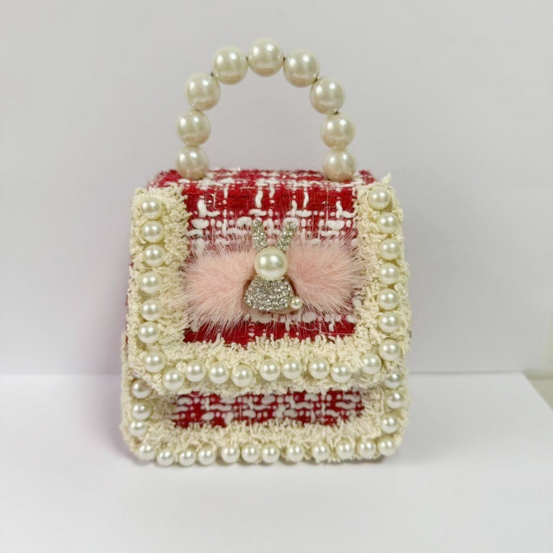 2025 primavera y verano estilo caliente moda casual niños dulces bolsa de gelatina mini bolso de mensajero de un solo hombro variedad al por mayor