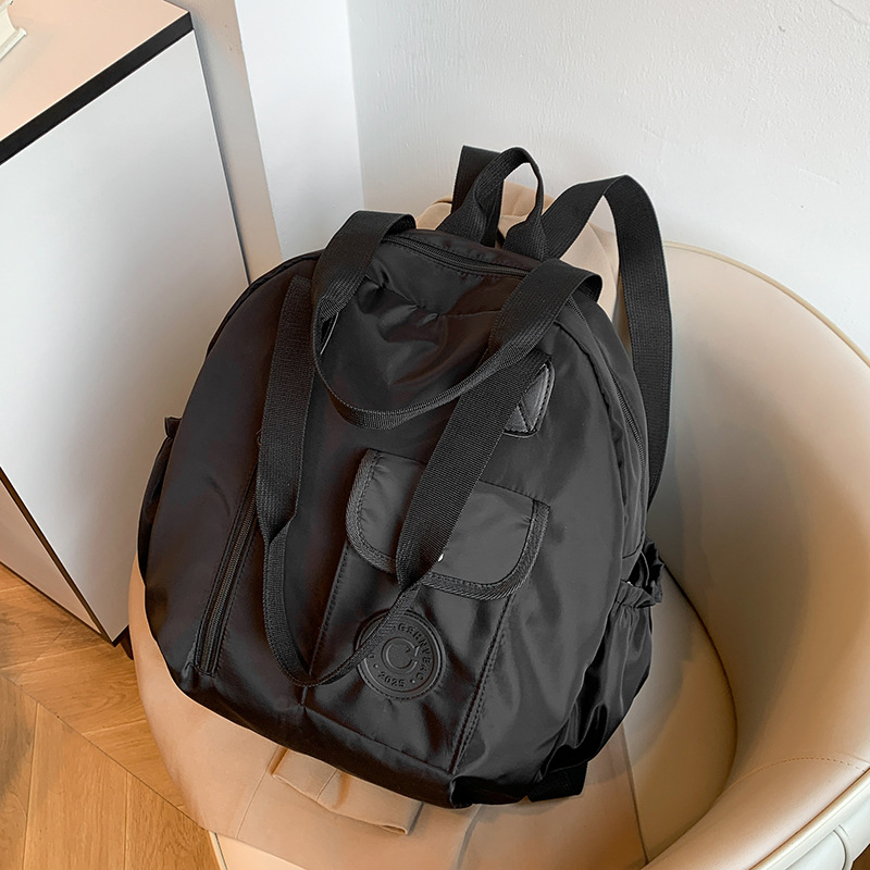 Otoño nuevo estilo de alta sensación compacto simple versátil gran capacidad viaje mochila de hombro bolsa multipropósito hombro