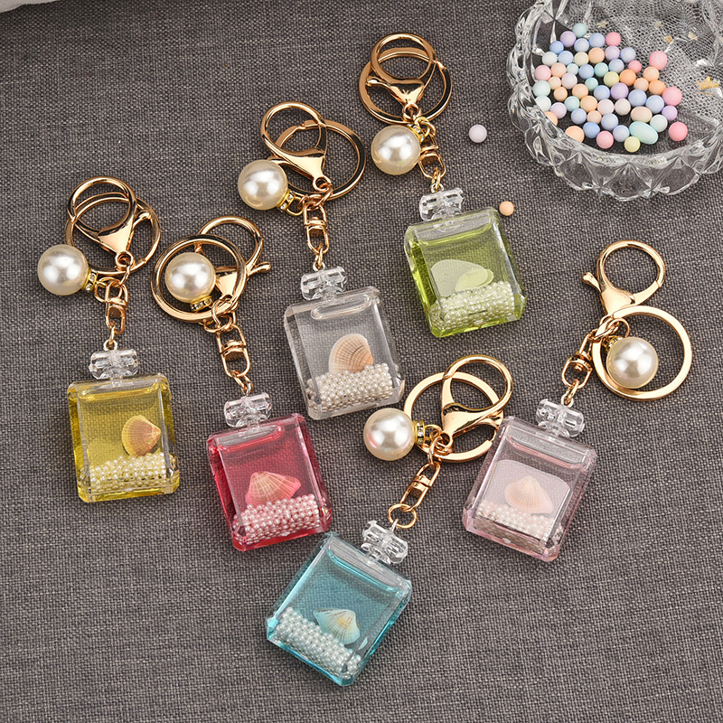 New Pearl Key Chain Accessories Acrylic Keychain Student Schoolbag Pendant Cute Perfume Bottle Couple Bags display picture 1