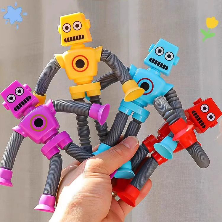 Tubo telescópico robot luminoso y cambiante para niños descomprimiendo juguetes pequeños regalos los estudiantes de jardín de infantes recompensan los regalos de cumpleaños