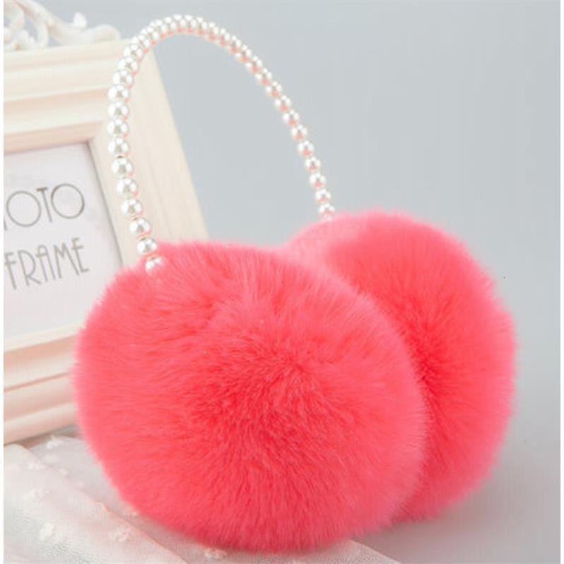 Nueva caliente lindo orejeras de felpa de invierno caliente a prueba de frío fábrica al por mayor de piel de conejo orejeras piel