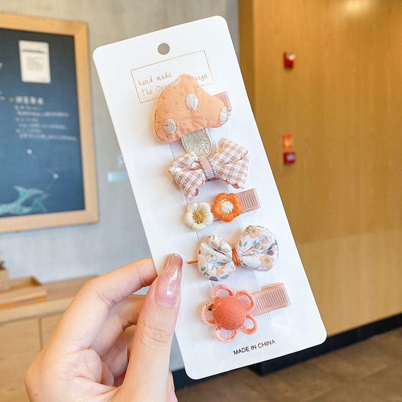 Niños lindos flores de dibujos animados clip para el cabello bebé pequeño clip no lastimar el cabello de la tela de la niña clip de borde de la mejilla