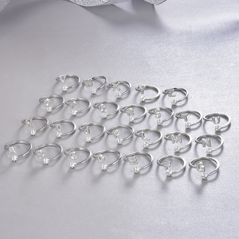 Amazon popular s925 plata esterlina 26 inglés letra anillo europeo y americano moda abierta diamante anillo pulsera de las mujeres