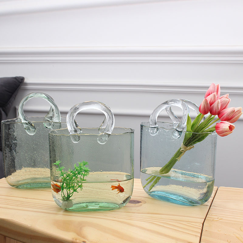 Bolsa de mano, jarrón de vidrio, florecer en línea, jarrón simple, jarrón transparente, jarrón creativo, acuario de peces de alto valor.