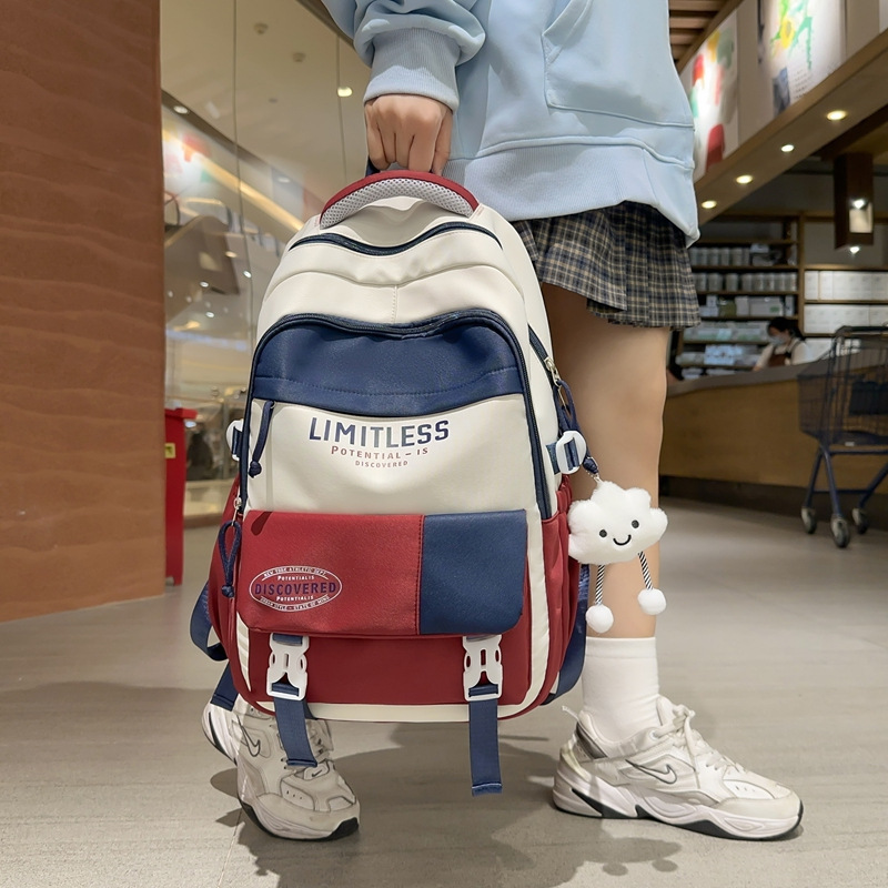 Mochilas escolares de alto valor facial nuevas estudiantes de primavera 2025 moda ligera y viajes al aire libre de gran capacidad con bolsos de hombro