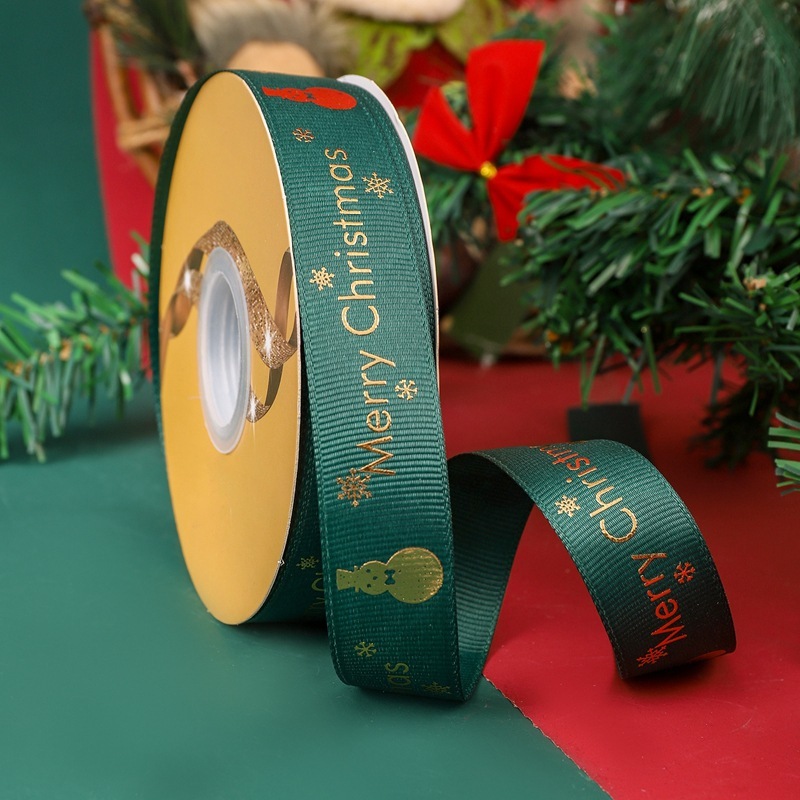 クリスマスリボン卸売 2.5cm クリスマスリボン メリークリスマス文字金箔入りリボン|undefined