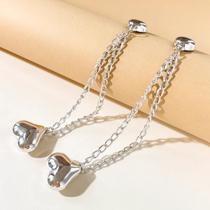 Esquina de la camiseta, peldaño apretado, artefacto corto, botones de nudos, mangas fijas, pantalones fijos, pies, cadena anti-flip, botones de succión magnéticos