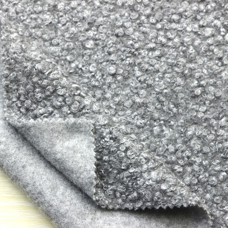 阳离子针刺毛绒仿羊绒米花绒羊圈尼毛呢蚂蚁绒卷曲绒针刺绒布面料