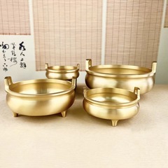 真鍮の光沢のある香炉の銅の香炉の置物は仏陀に供えます。