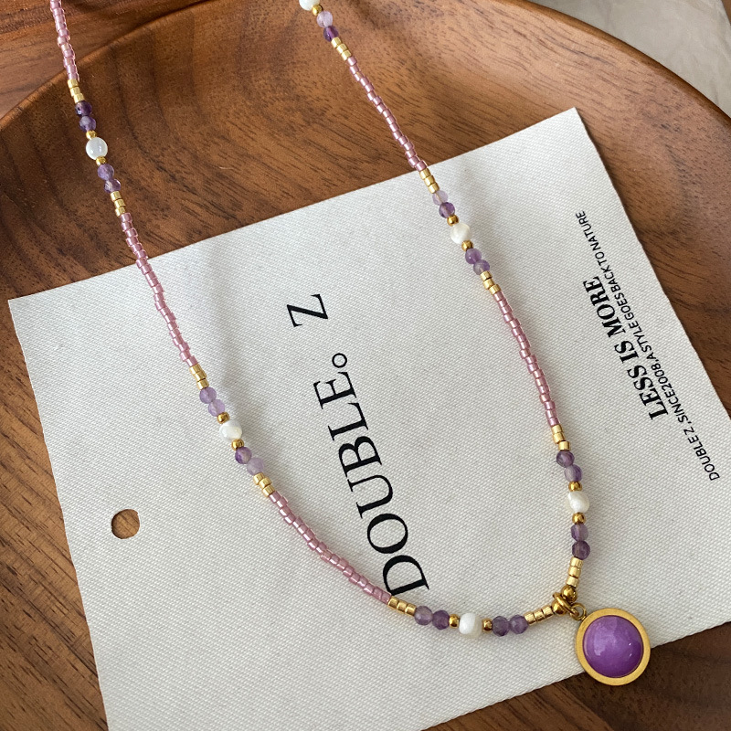 Collar con cuentas de ojo de tigre Maillard Cadena de suéter de otoño e invierno de alta calidad Acero de titanio Cadena de clavícula de piedra natural retro de lujo ligero