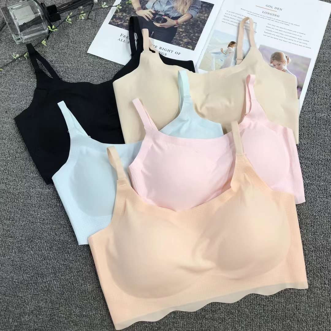 Nueva ropa interior deportiva de color sólido de las mujeres pequeño pecho push up pecho grande pequeño sujetador inalámbrico adhesivo sin costuras Sujetador deportivo