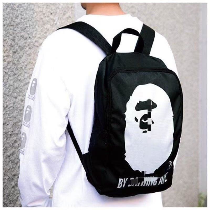 BAPE solid color simple wear-resistant plaid backpack with large logo, casual fashion bag for students in the back-to-school season