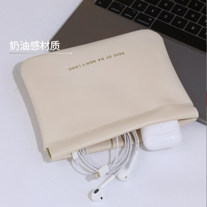 Fábrica al por mayor pieza de primavera pu auricular automático boca apretada bolsa de almacenamiento inalámbrico auricular cable de datos Portátil Bolsa de metralla