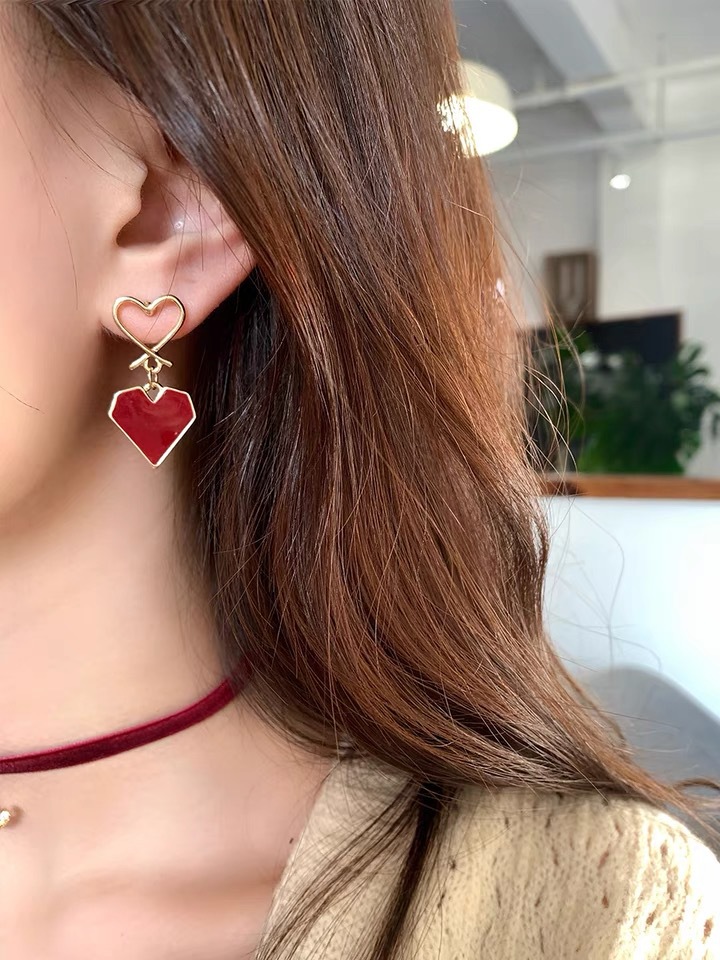 fashion contrast color hollow double heartshaped metal earrings wholesalepicture2