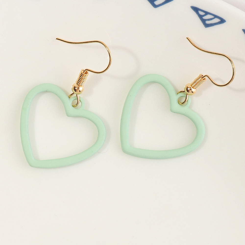 Boucles D'oreilles Simples En Forme De Coeur De Couleur Unie En Gros display picture 7