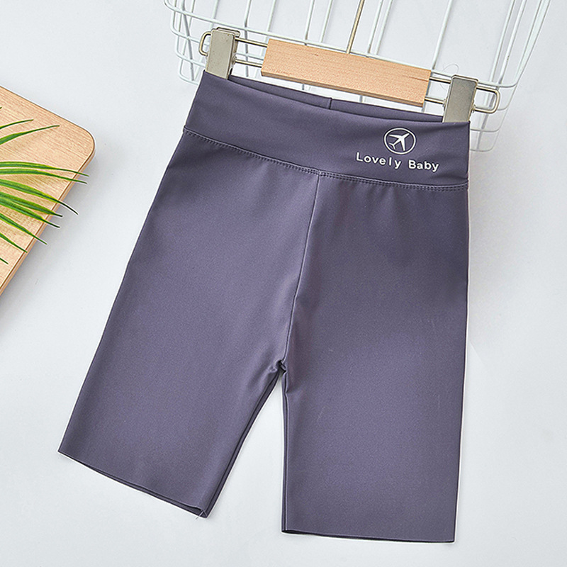 Pantalones de tiburón de cinco puntos para niñas pantalones de yoga de desgaste exterior de cintura alta delgada de verano para niños medianos y grandes leggings Barbie para niños pantalones cortos