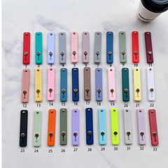 Suitable for men and women, mobile phone case wristband finger self-adhesive lazy holder candy-colored tpu plus pu pull-type mobile phone holder
