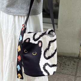 可爱卡通黑猫水桶包松弛感百搭单肩斜挎包潮韩系慵懒风帆布包包女