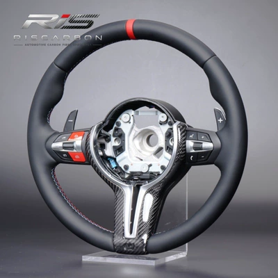 cover with red M | Steering wheel