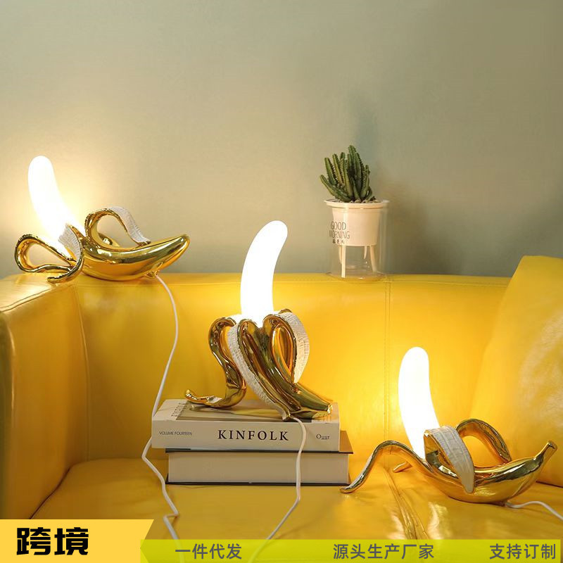 Cross-border e-commerce banana desk lamp Nordic modern creative living room study bedroom bed light luxury resin decorative desk lamp