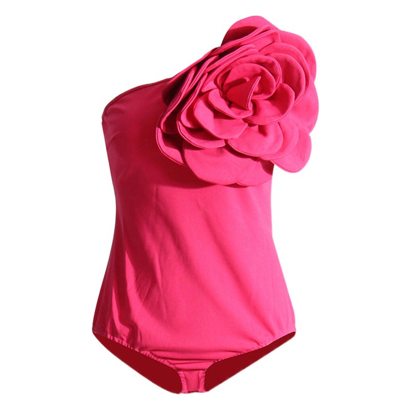 2024 verano nuevo europeo y americano hombro oblicuo diseño tridimensional flor costura sin mangas color sólido mono sexy moda ropa de mujer