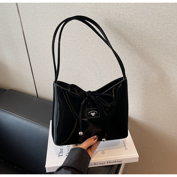 Women's fashion bucket bag 2025 new retro handbag, bow single-shoulder bag, solid color versatile underarm bag undefined