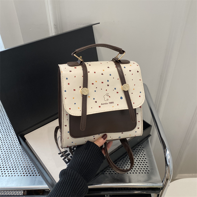 Textura retro moda color onda punto bolso mujer 2025 primavera nueva mochila de transporte público nicho diseño mochila