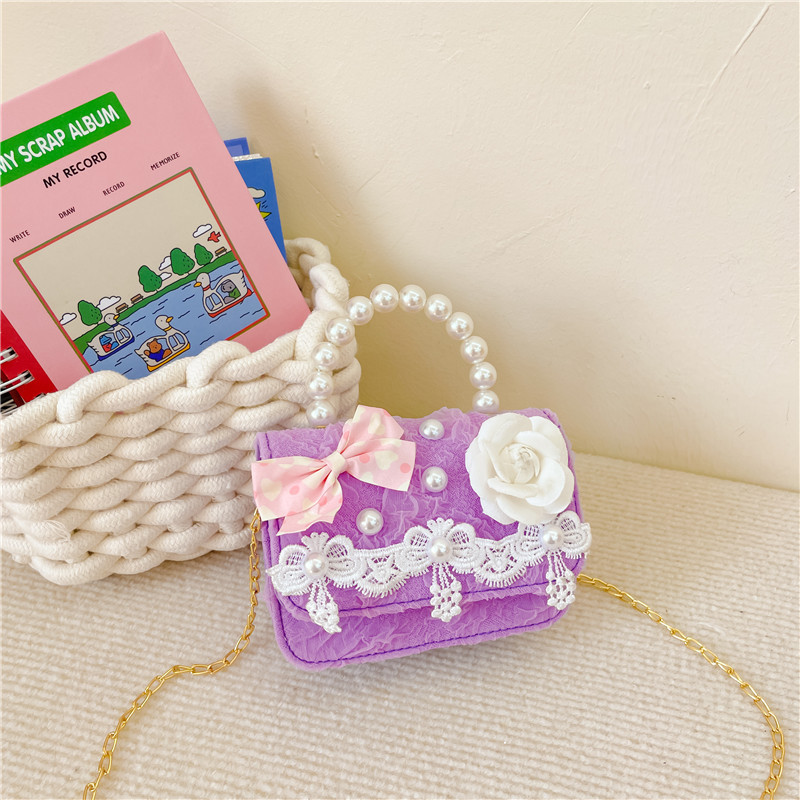 Bolsa para niños bolsa de mensajero de aire exterior 2022 nueva niña moda linda princesa bolsa de hombro pequeña fragancia bolso