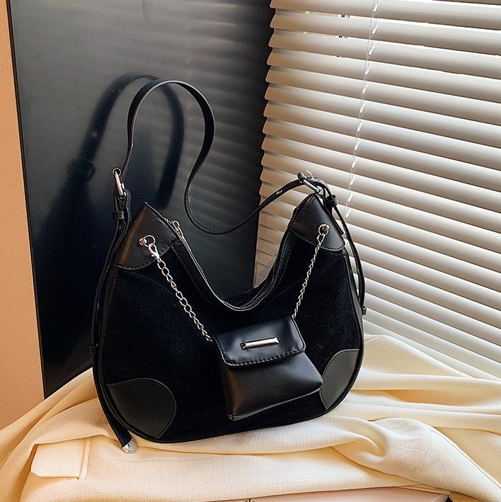 Otoño y invierno bolsas de cuero de gamuz mate para mujeres 2025 nuevas bolsas de brazo de hombro casuales versátiles bolsas de alta calidad de moda