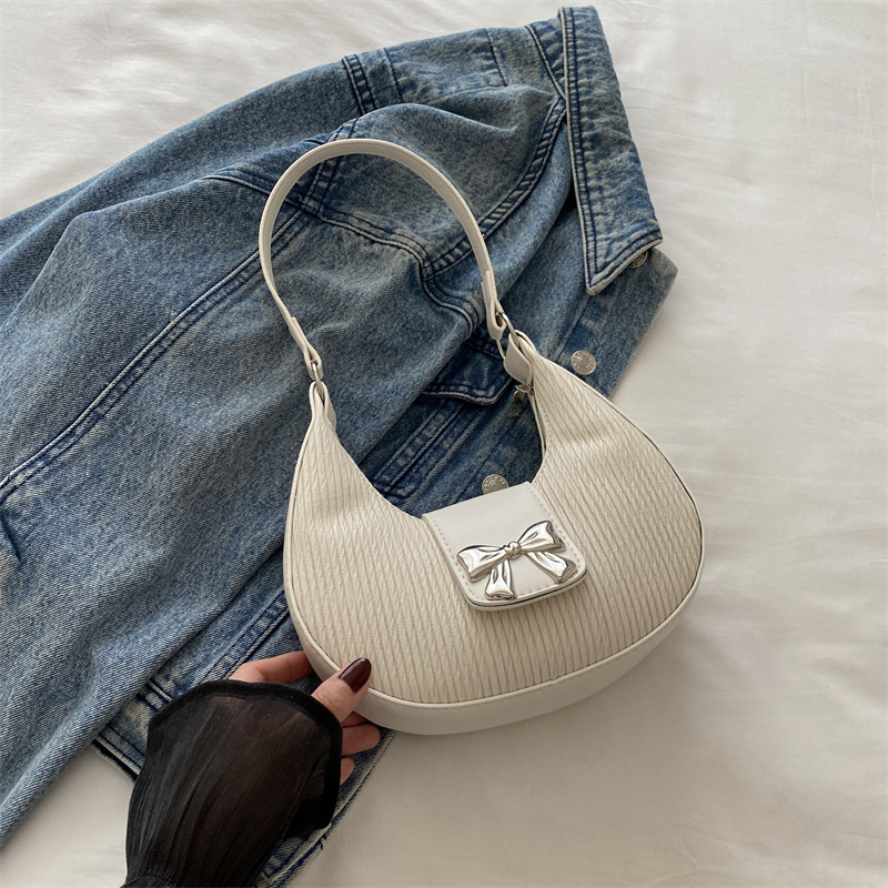 Bolsa debajo de la axila temperamento de alto valor facial bolso de mujer nicho de diseño bolso de hombro de invierno 2024 nuevo temperamento de arco mujer