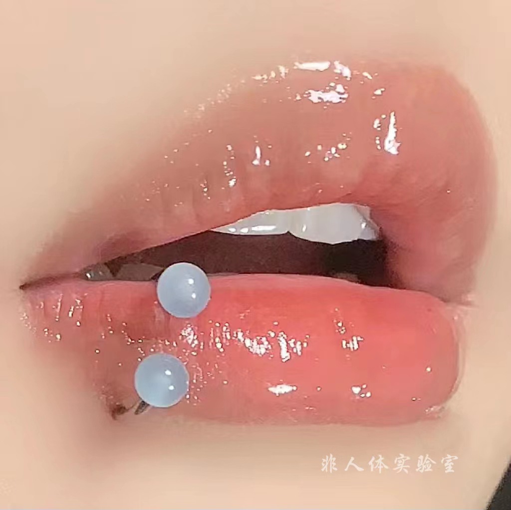 Labret stud lip piercing jewelry styling detail