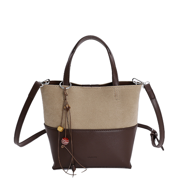 Bolso de moda transfronteriza retro bolso de cubo de agua mujer otoño y invierno 2025 nuevo estilo versátil bolso de hombro de viaje