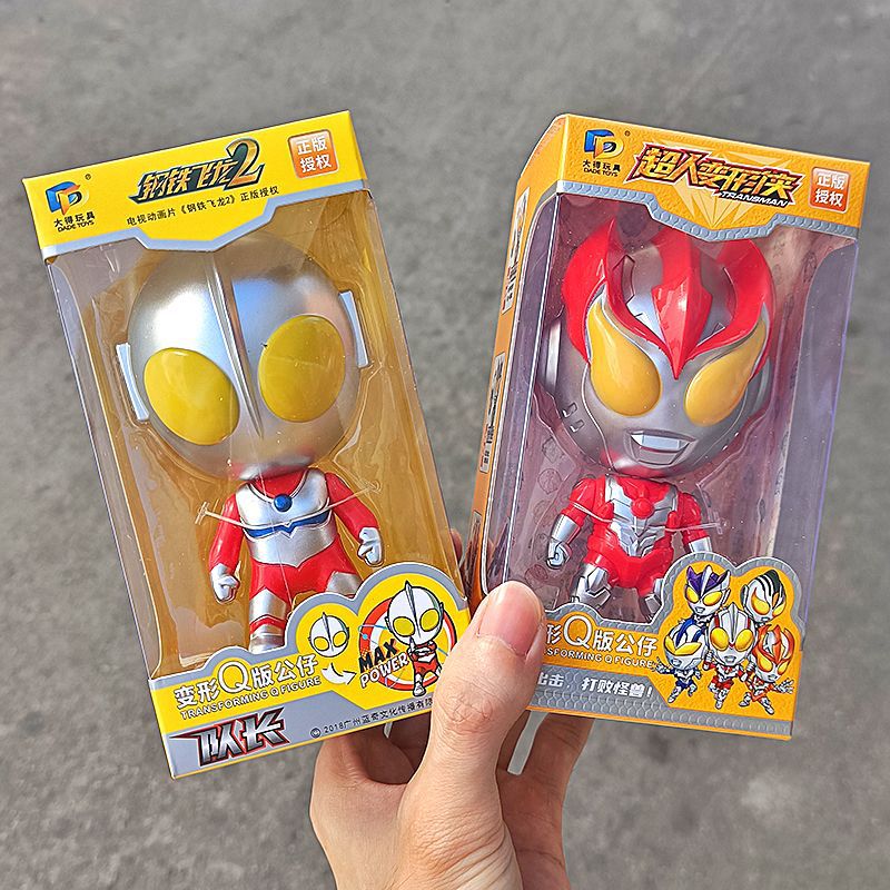 어린이 올림픽 슈퍼맨 변형 장난감 Q 버전 GASHAPON 인형 어린이 펜던트 선물 상자 소년의 사탕 장난감 장식품
