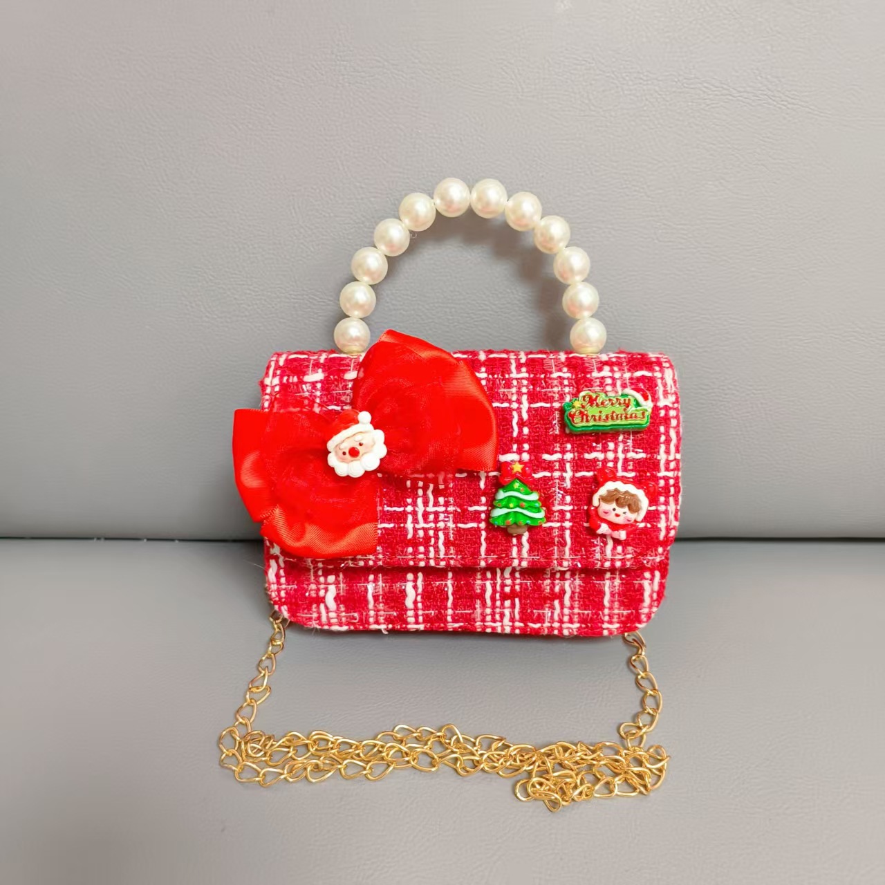 Cartera de Año Nuevo rojo arco de papá Noel bolso de perla pequeña cadena de viento fragante bolso de hombro