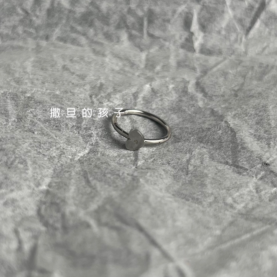 Silver pointed spike labret stud material detail