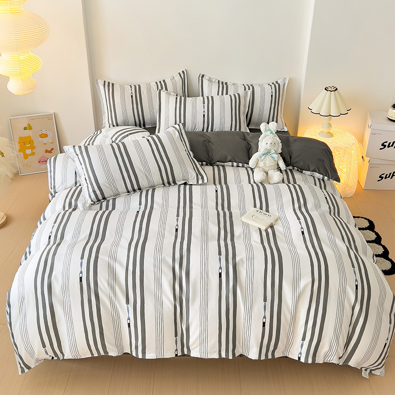 Engrosado cepillado de cuatro piezas dormitorio de un solo estudiante de tres piezas simple sábana colcha cubierta regalo ropa de cama al por mayor