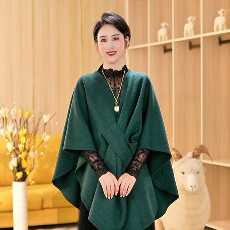 Miss He Da nuevo estilo de otoño y invierno en línea temperamento caliente estilo largo temperamento exterior con un chal de color sólido suelto