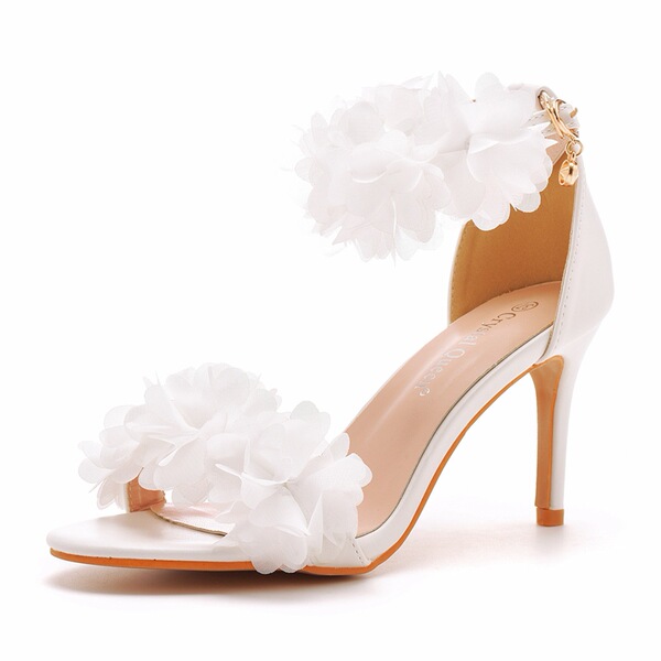White sandals low-cut with a strap stiletto heels