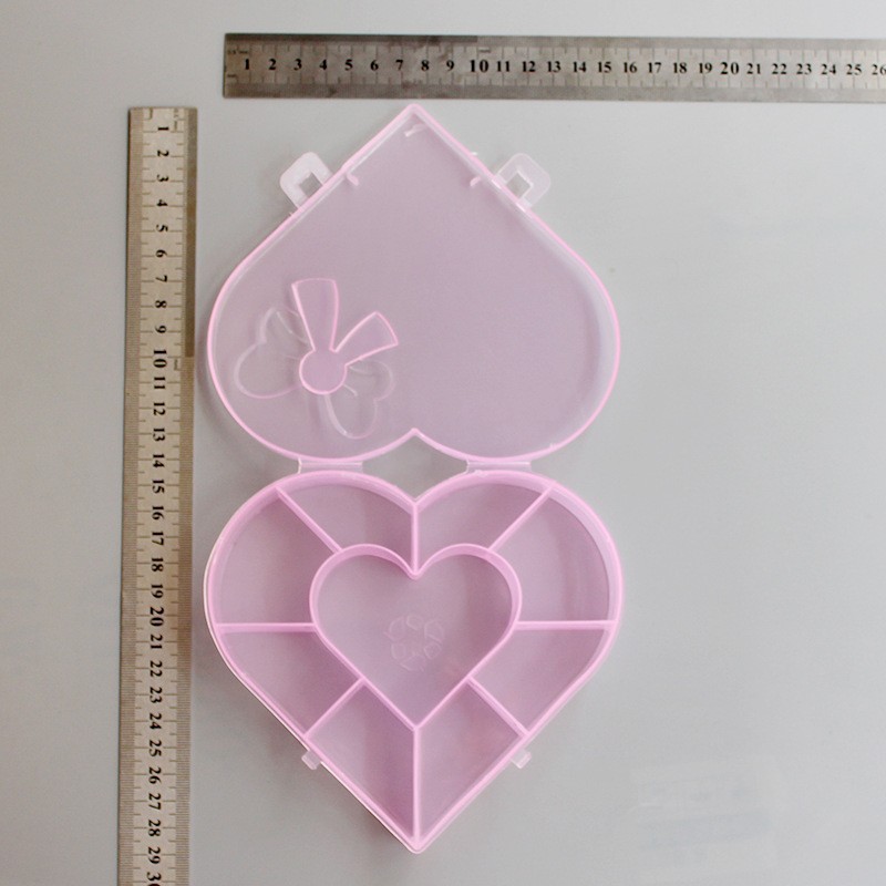 Directo de fábrica PP material amor arco multi-rejilla caja de almacenamiento transparente joyería accesorios para el cabello niños regalo de plástico