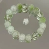 E19 green seed bead flower bracelet