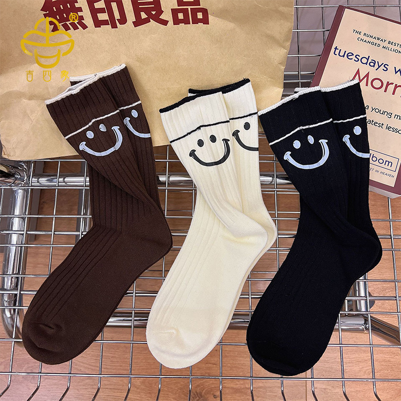 Jisixiang socks women's autumn and winter New Korean style hot stamping cartoon smiley face mid-calf socks combed cotton double needle pile women's socks
