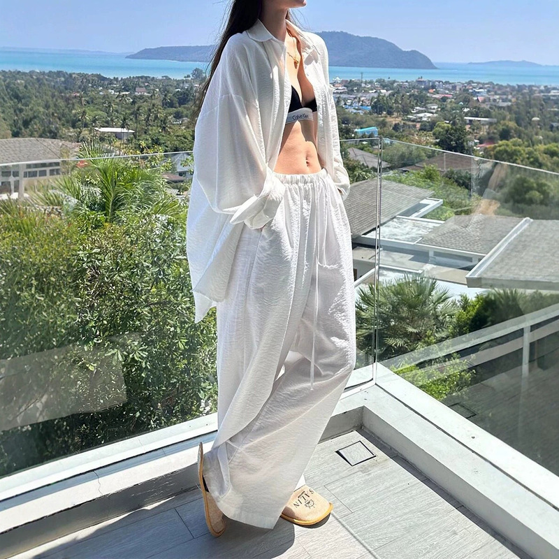 Casual long white shirt for seaside vacations, sun protection cover-up, versatile for daily commuting, loose-fitting white shirt for women
