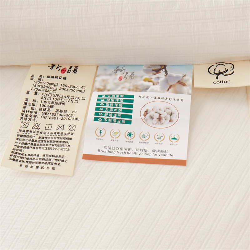 新疆の綿の布団の家庭用冬の布団は厚くなります。