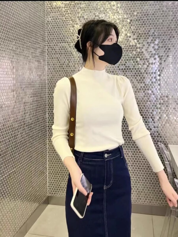 半高襟秋冬ニットセーター女性長袖ゆるいシャツの中襟に泡袖の上着がついている|undefined