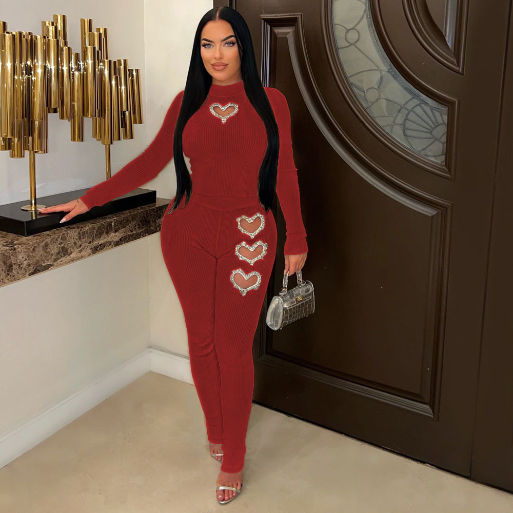 Vêtements pour femmes Y1280 vente chaude vêtements pour femmes automne et hiver nouveaux produits à manches longues en forme de coeur creux diamant chaud costume de couleur unie_voghion.com