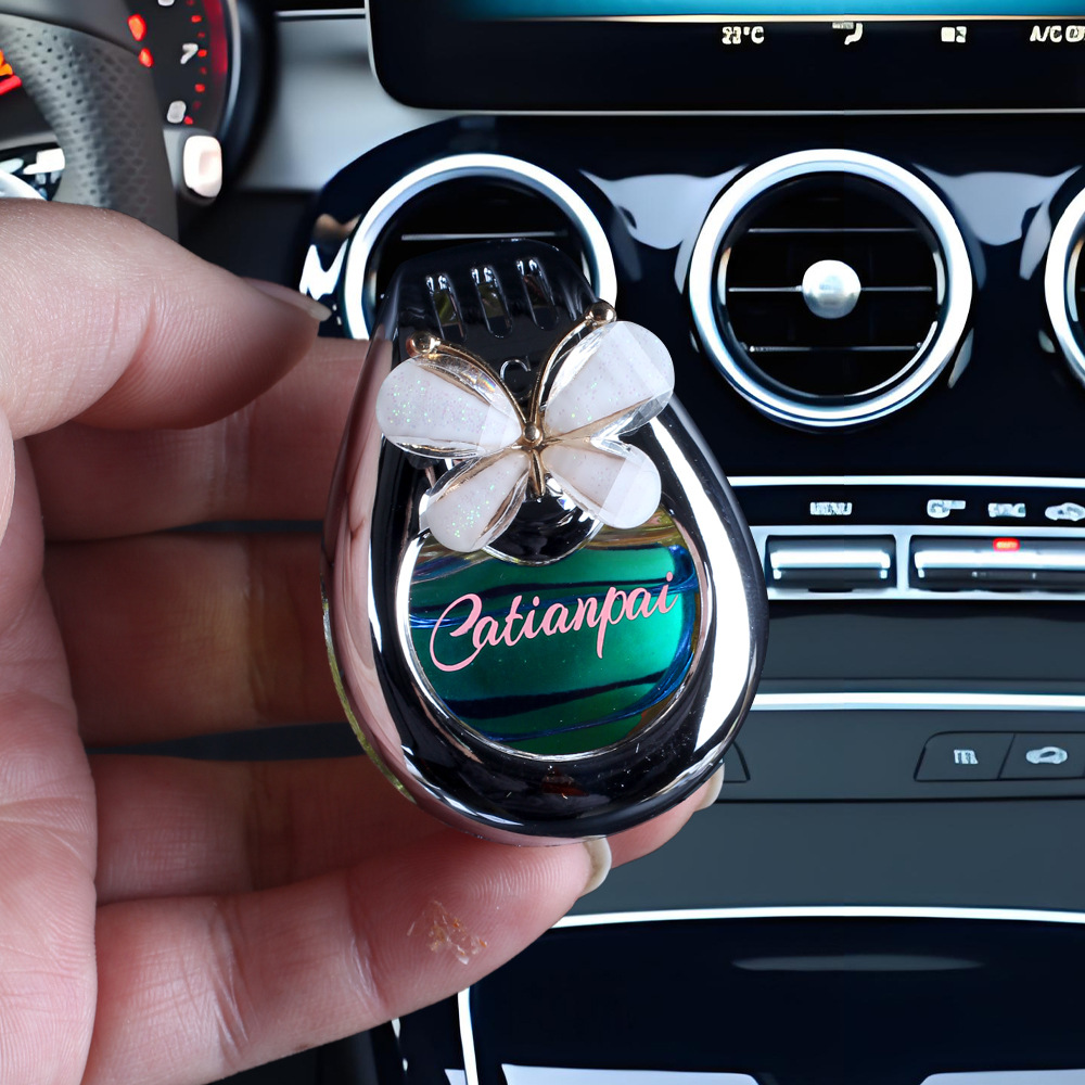 Aromaterapia para coche 2025 nuevo perfume de coche con lazo de fragancia de larga duración, adornos para coche, plástico de fragancia ligera de larga duración