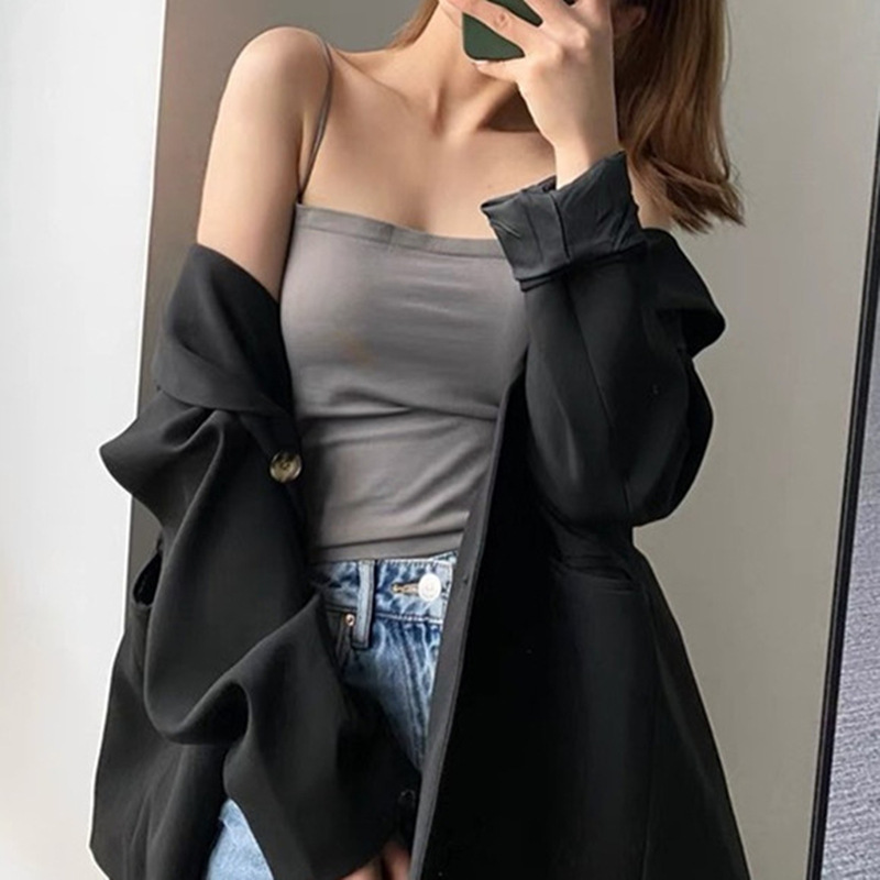 Trendy summer backless camisole for women, wearable as outerwear, with supportive bra pads, thin straps, and as a base layer. Wholesale available.