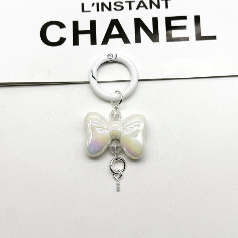 蝶結びのキーホルダーのカバンはスプリングを掛けてdiyのアクセサリーの部品を掛けます。|undefined