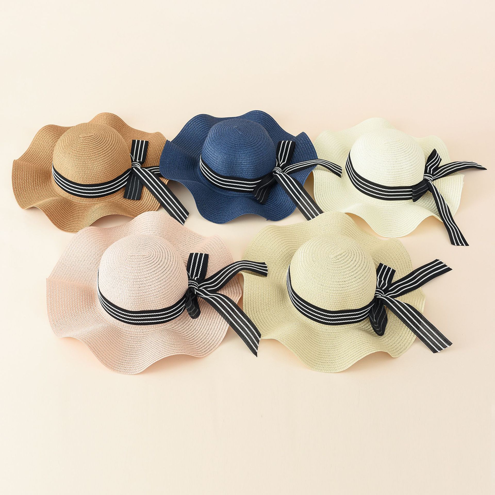 2021 verano nuevo estilo coreano cinta de mujer arco sombrero de paja verano Delgado transpirable sombrero de sol al aire libre lindo